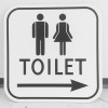 Skilt med piktogram "Toilet Dame/Herre"